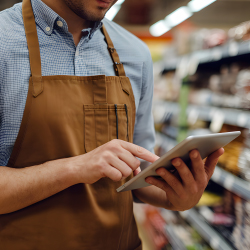 Supermarket manager planning store layout with JSI custom displays