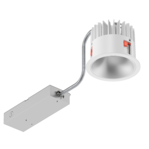 The white 6 inch High Output Downlight circular light engine housing, featuring the external driver compartment. Seen from an angle below the fixture.